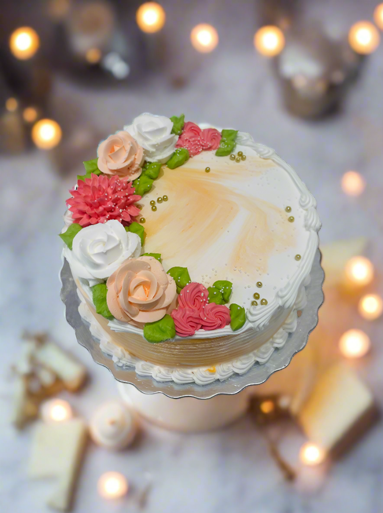 Orange And White Cream Flower Cake