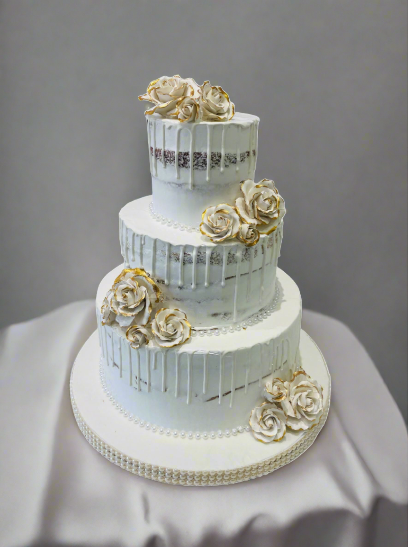 Gold & White Drizzle Wedding Cake