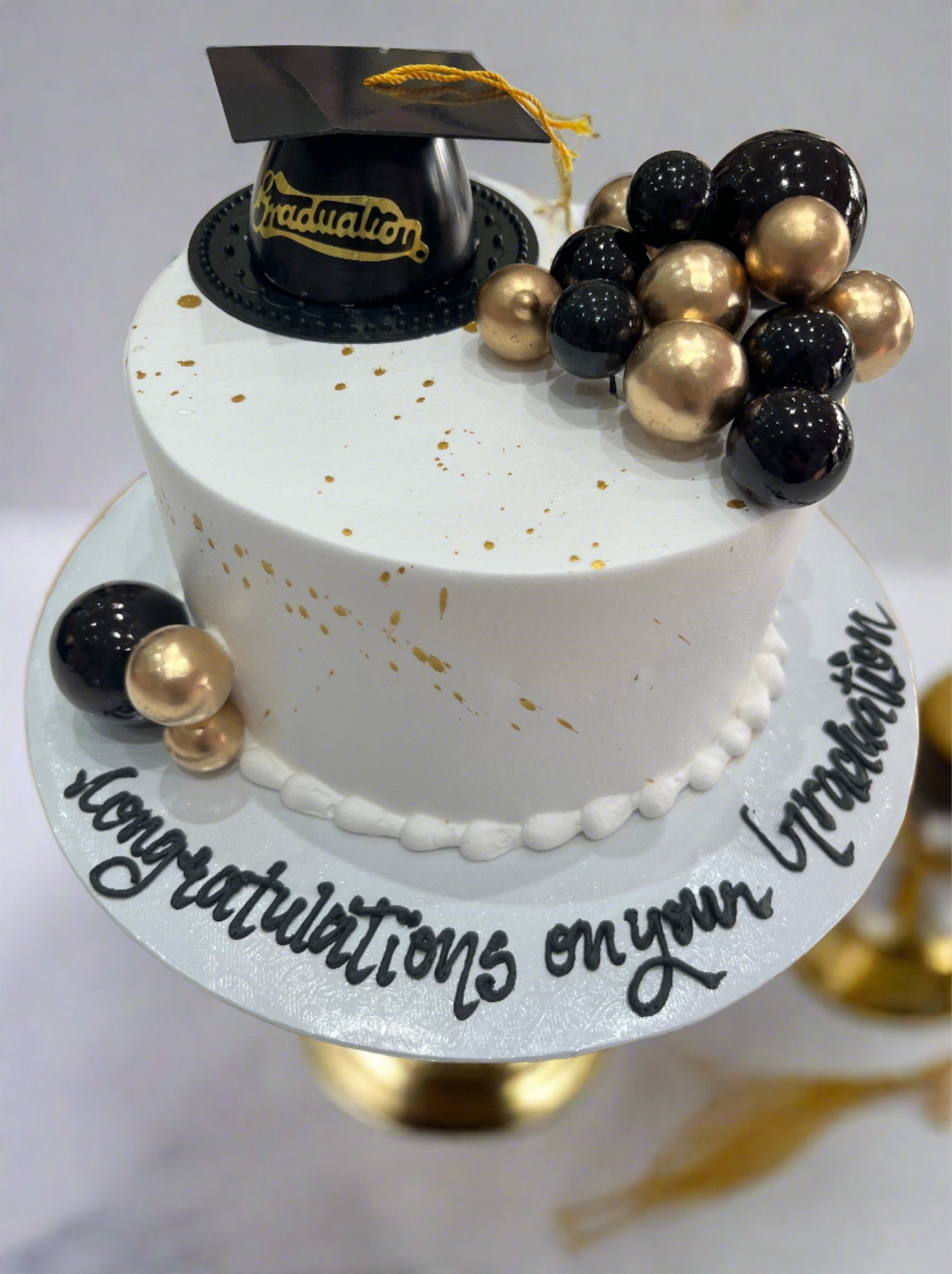 Black & Gold Graduation Cream Cake