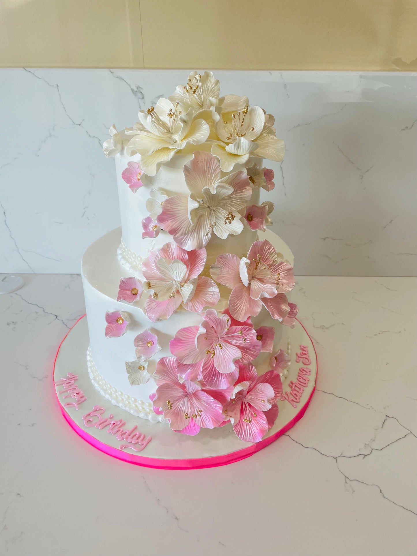 Pink Cascading Flowers Wedding Cake