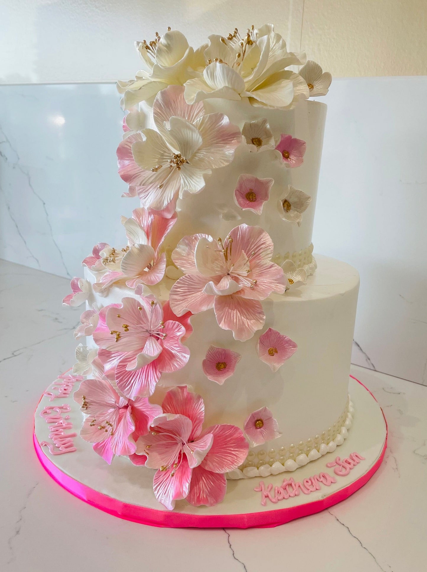Pink Cascading Flowers Wedding Cake