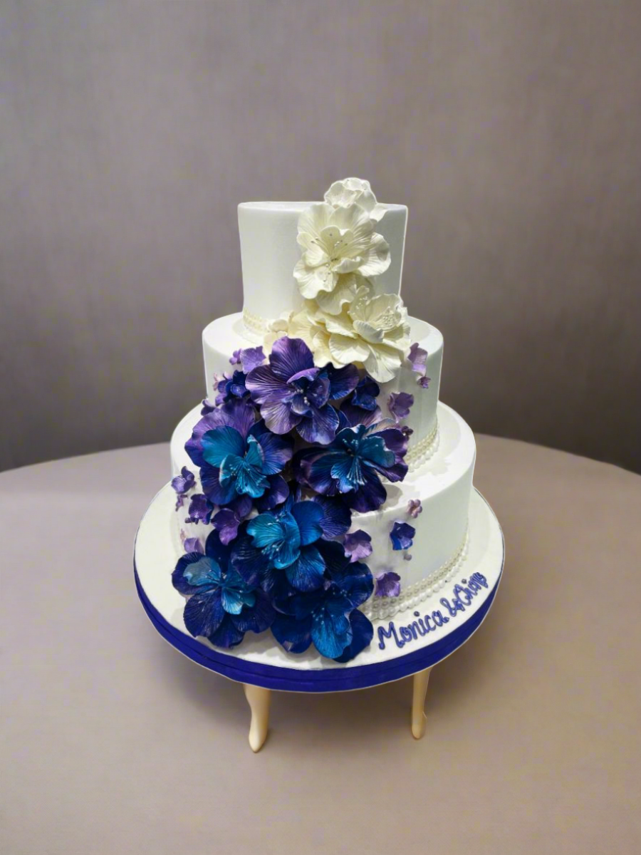 Purple & Blue Cascading Flowers Wedding Cake