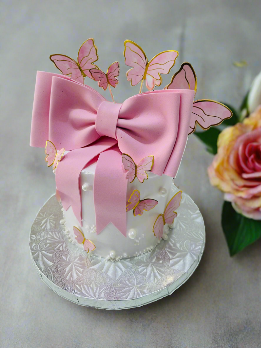 PINK BOW BUTTERFLY CREAM CAKE