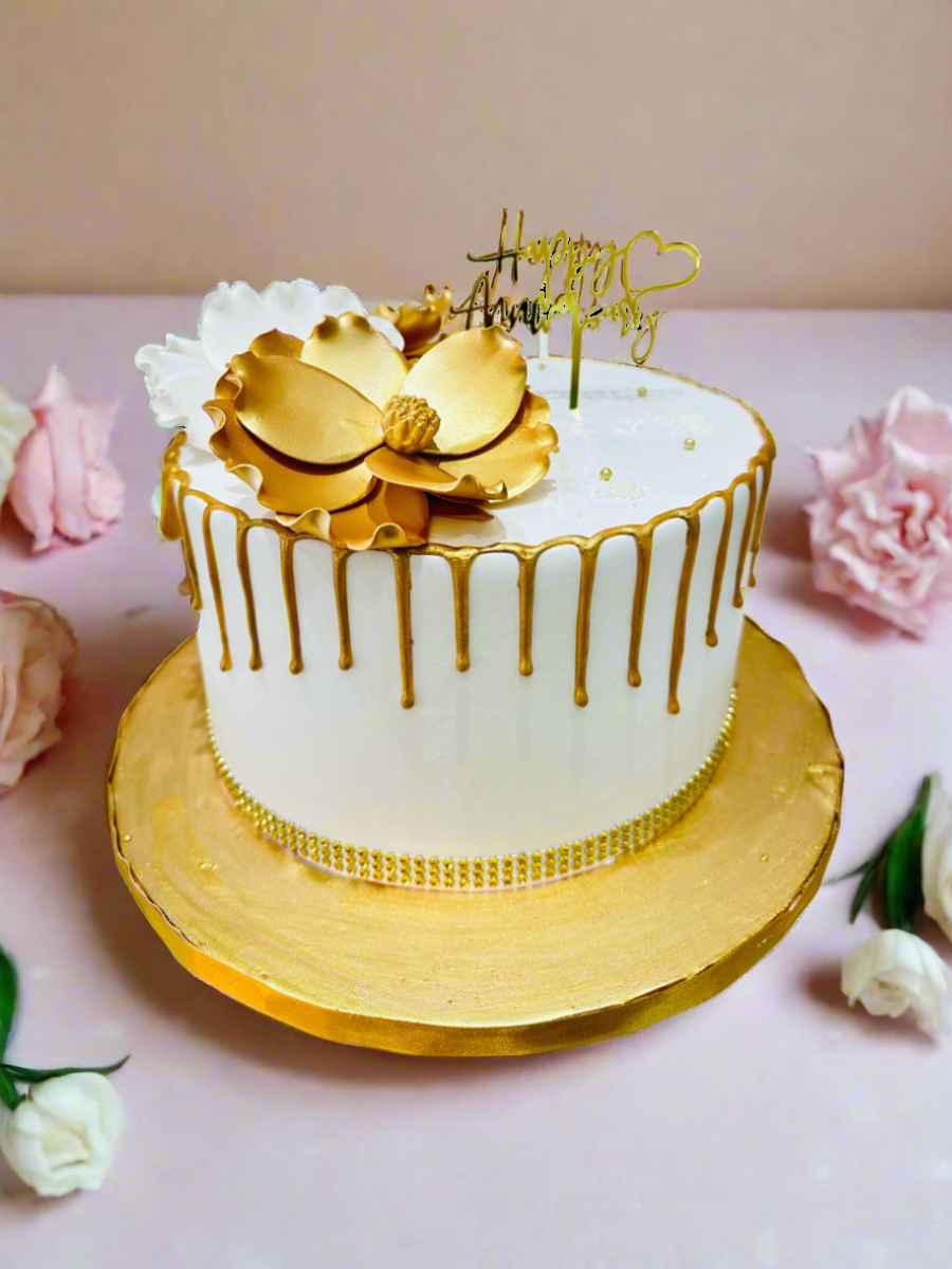 WHITE & GOLD ANNIVERSARY FLORAL CAKE