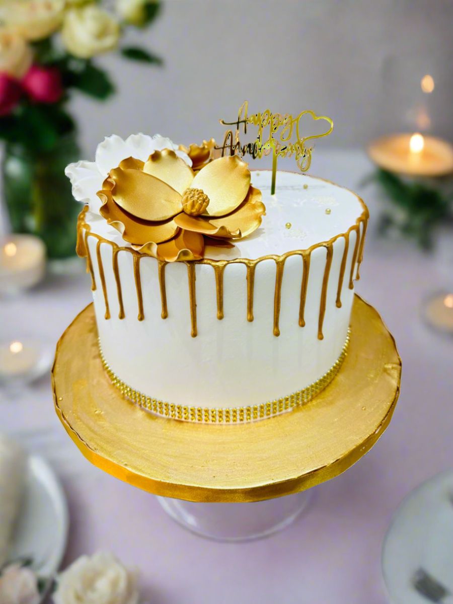 WHITE & GOLD ANNIVERSARY FLORAL CAKE