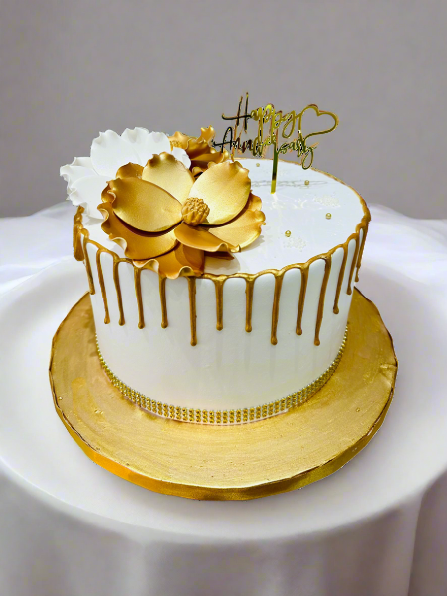 WHITE & GOLD ANNIVERSARY FLORAL CAKE