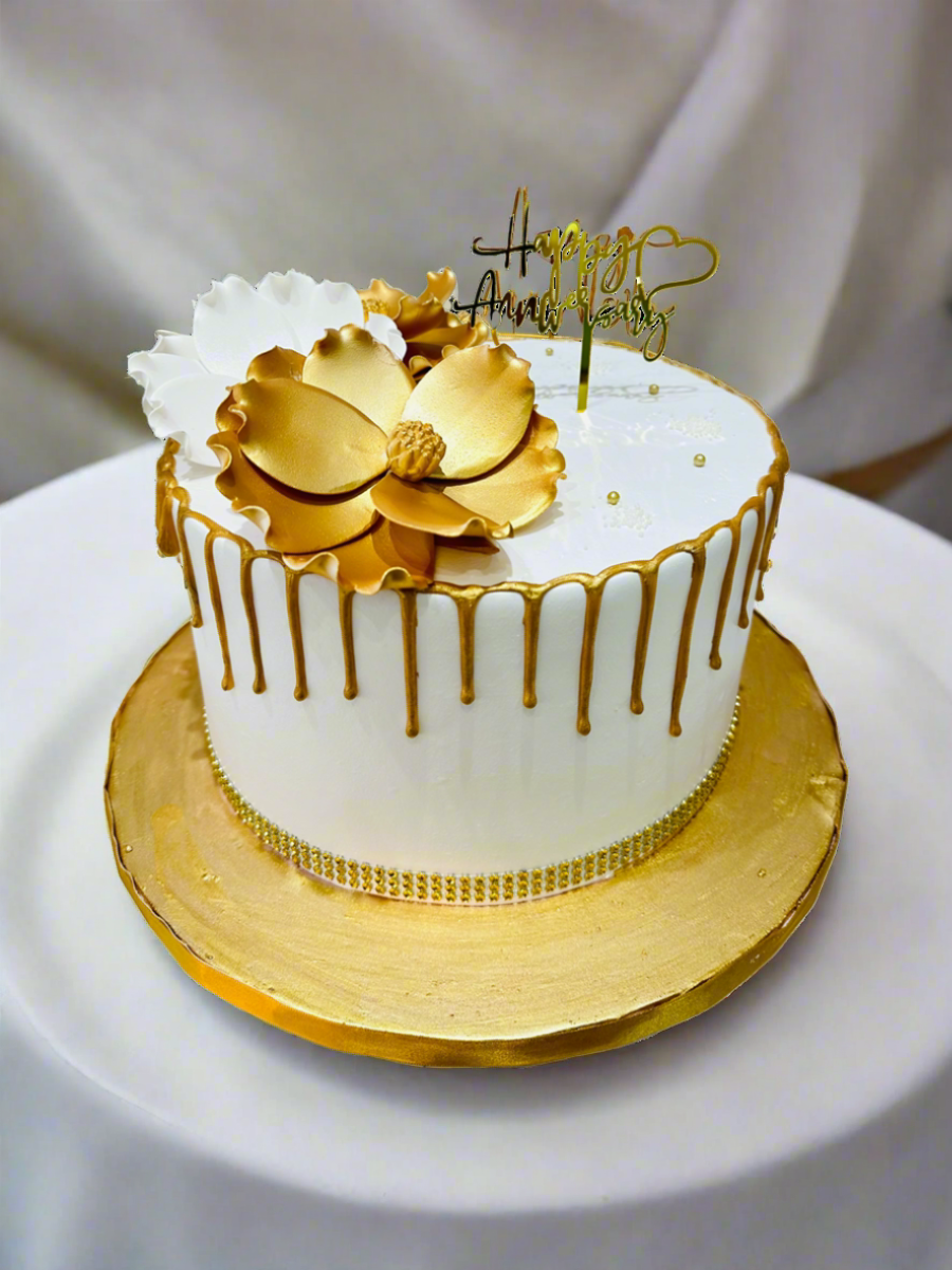 WHITE & GOLD ANNIVERSARY FLORAL CAKE